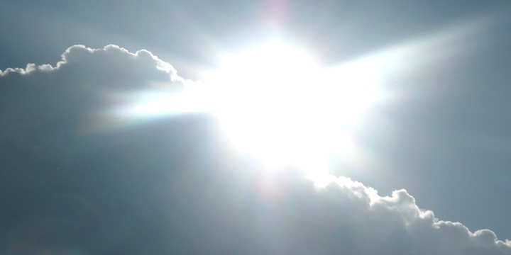 Picture of the sun breaking through the clouds